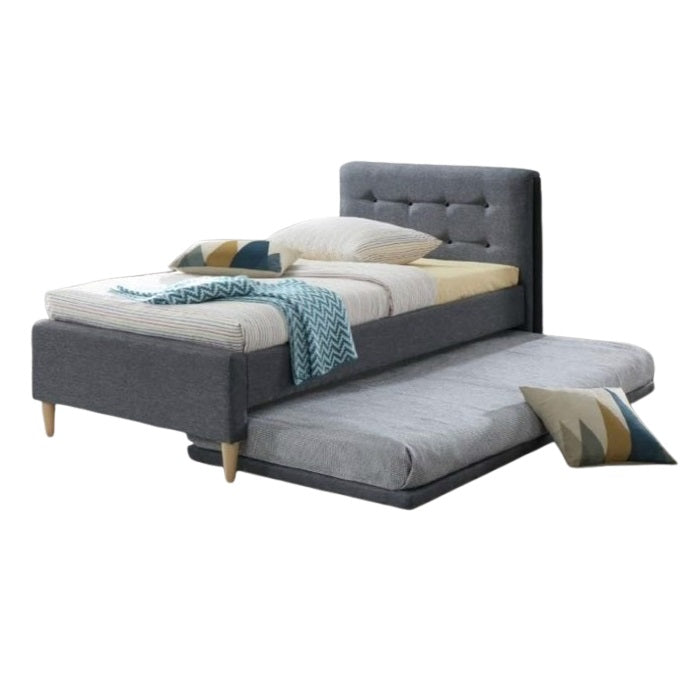 A stylish bed featuring a decorative headboard and footboard, showcasing a modern design in a cozy bedroom setting.