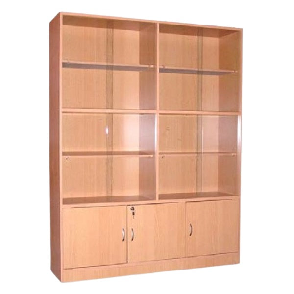 A wooden bookcase with glass doors and drawers, providing a refined storage solution for books and decorative objects.