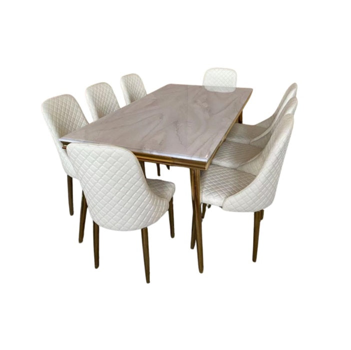 A modern white dining table accompanied by eight matching chairs, perfect for family meals or gatherings.