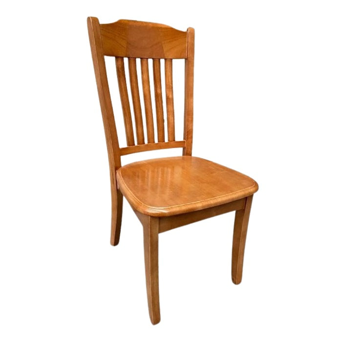 A modern dining table with matching chairs, designed for comfort and social dining experiences.