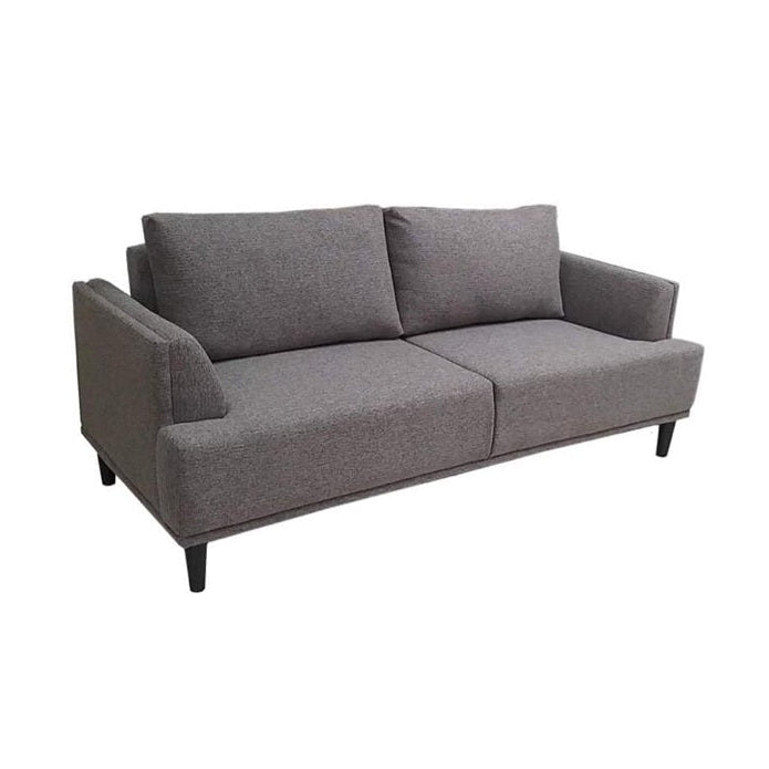 A modern brown couch with two accent pillows, offering a chic and comfortable seating option.