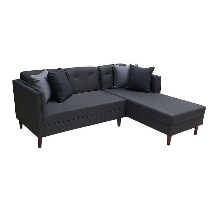 A stylish sectional sofa with an attached chaise, perfect for comfortable seating in contemporary interiors.