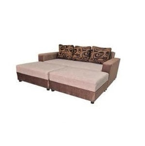 A brown and beige sectional couch adorned with decorative pillows, offering a cozy and inviting living space.