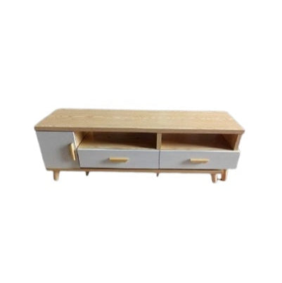 A wooden entertainment center with a television on top, serving as a focal point for home entertainment and decor.