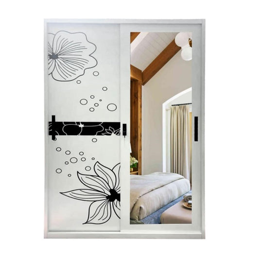 A white wardrobe featuring a delicate design on its door, adding a touch of nature to the furniture.