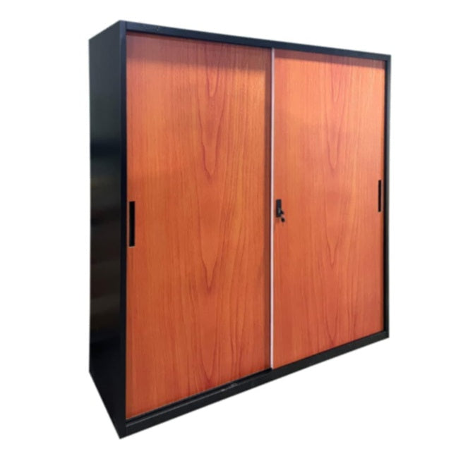A brown wardrobe featuring a delicate design on its door, adding a touch of nature to the furniture.