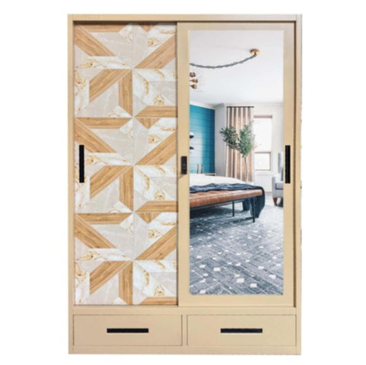 A beige wardrobe featuring a delicate design on its door, adding a touch of nature to the furniture.
