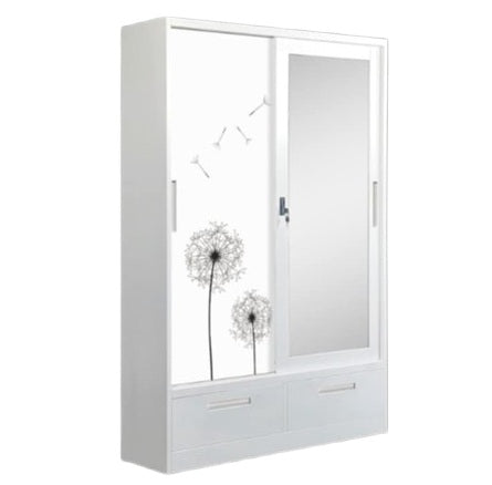 A white wardrobe featuring a delicate design on its door, adding a touch of nature to the furniture.