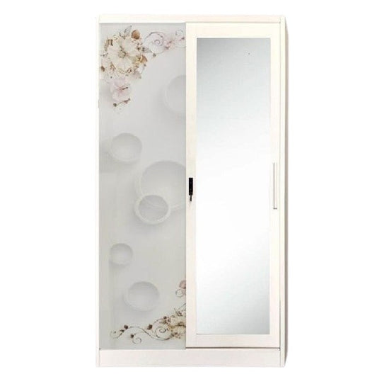 A white wardrobe featuring a delicate design on its door, adding a touch of nature to the furniture.