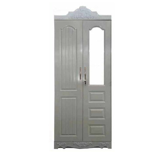 A metal door with  glass panels, surrounded by a classic  frame, showcasing craftsmanship and design.