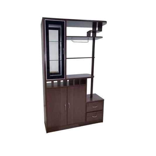 A stylish bar counter featuring a wine rack and shelves, elegantly displaying various bottles and glassware.