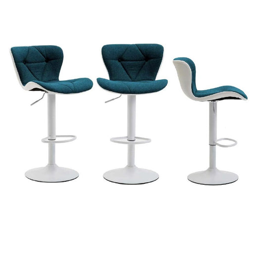 Chic teal bar stools positioned together, offering a fresh and inviting look for a dining or bar setting.