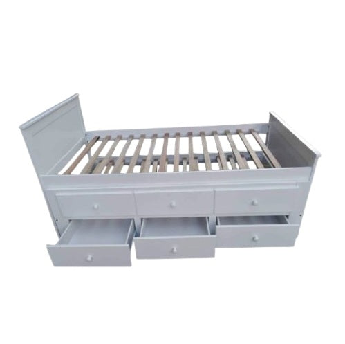 A functional bed design that includes drawers for organization, complemented by a soft mattress for restful sleep.