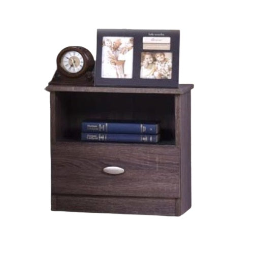 A bedside table adorned with a clock and several photographs, enhancing the room's intimate and inviting ambiance.