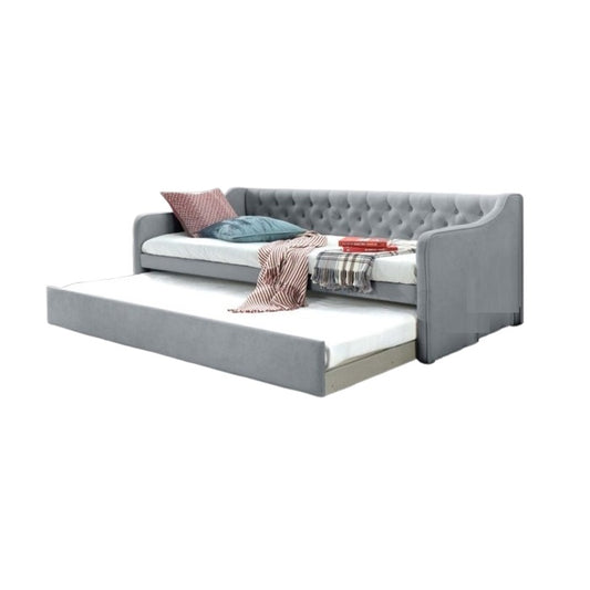 A modern daybed with an integrated pull-out drawer underneath, perfect for maximizing space in any room.