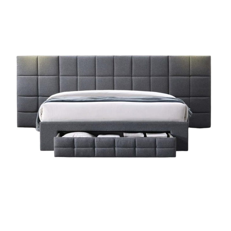 A stylish bed featuring a decorative headboard and footboard, showcasing a modern design in a cozy bedroom setting.