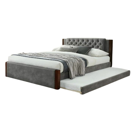 A stylish bed featuring a decorative headboard and footboard, showcasing a modern design in a cozy bedroom setting.