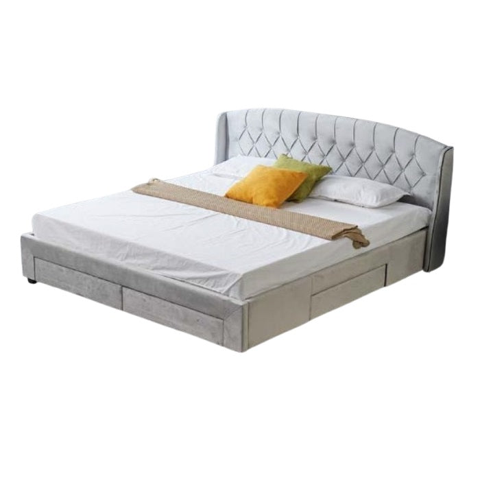 A stylish bed featuring a decorative headboard and footboard, showcasing a modern design in a cozy bedroom setting.