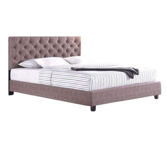 A stylish bed featuring a decorative headboard and footboard, showcasing a modern design in a cozy bedroom setting.