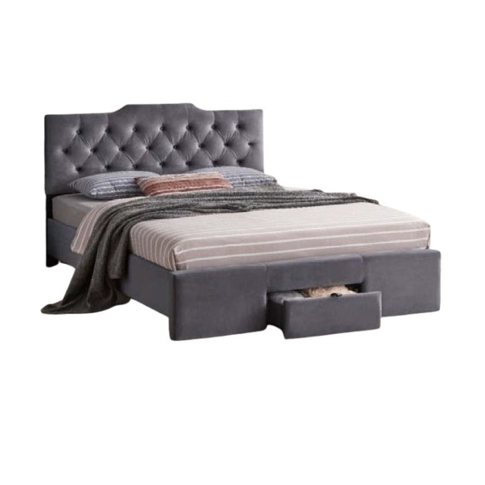 A stylish bed featuring a decorative headboard and footboard, showcasing a modern design in a cozy bedroom setting.