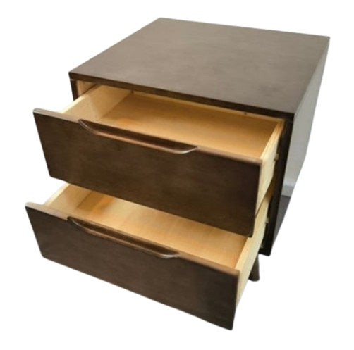 Stylish wooden side table with two doors, combining functionality and aesthetic appeal in a compact design.