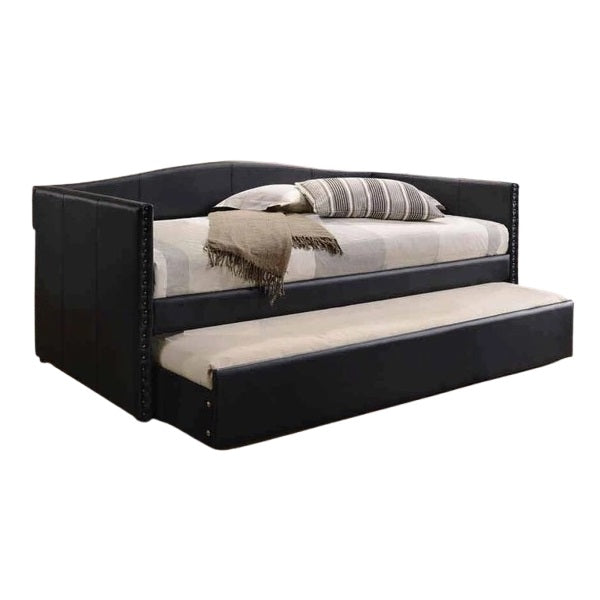 A modern daybed with an integrated pull-out bed underneath, perfect for maximizing space in any room.