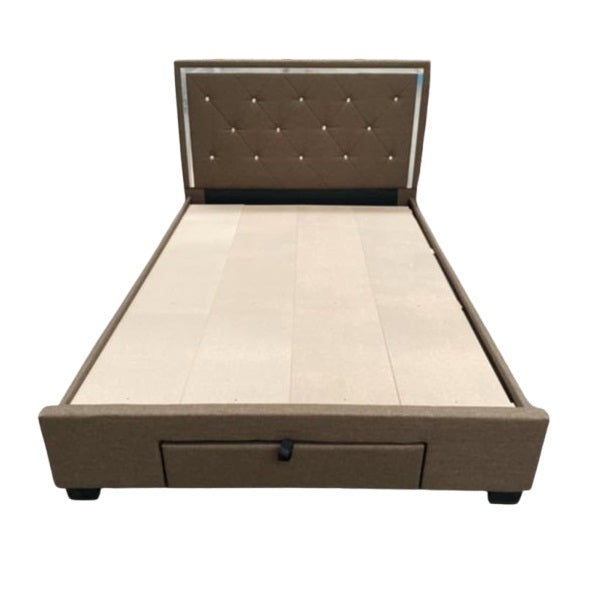 A stylish bed featuring a decorative headboard and footboard, showcasing a modern design in a cozy bedroom setting.

