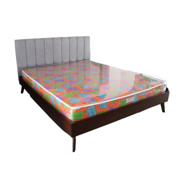 A sturdy bed frame made of wood, complete with a classic headboard and footboard, enhancing bedroom aesthetics.