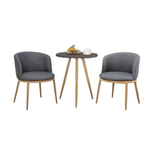 Two chairs flanking a round table, offering a welcoming space for conversation or dining.