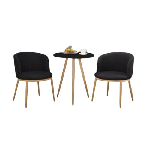 Two chairs flanking a round table, offering a welcoming space for conversation or dining.
