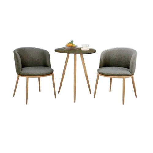 Two chairs flanking a round table, offering a welcoming space for conversation or dining.