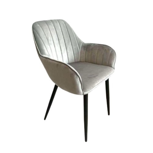 A contemporary grey chair with black legs, adorned with a chic chevron pattern, perfect for enhancing interior decor.
