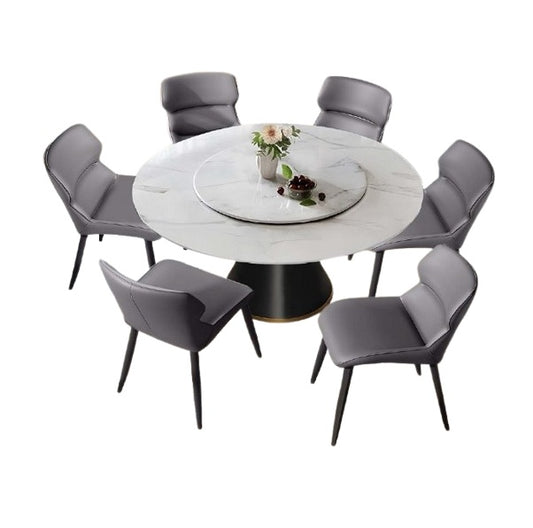 A modern dining table with matching chairs, designed for comfort and social dining experiences.