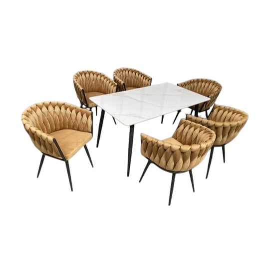 A stylish dining set featuring a table surrounded by elegant chairs, perfect for family meals and gatherings.