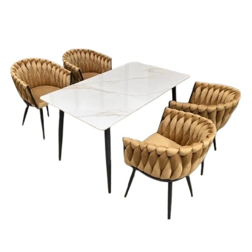 A stylish dining set featuring a table surrounded by elegant chairs, perfect for family meals and gatherings.