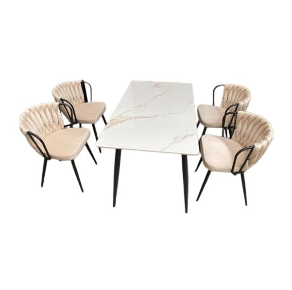 A stylish dining set featuring a table surrounded by elegant chairs, perfect for family meals and gatherings.
