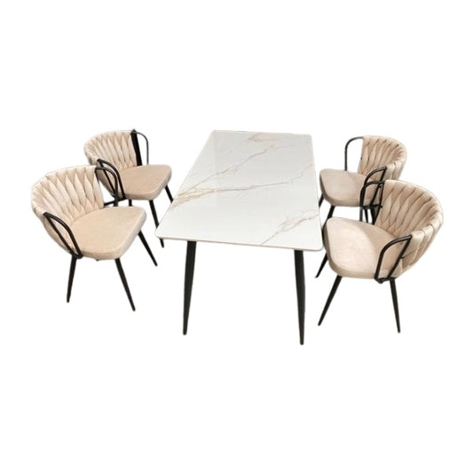 A stylish dining set featuring a table surrounded by elegant chairs, perfect for family meals and gatherings.