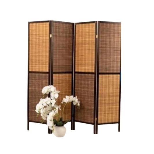 A bamboo screen serves as an elegant room divider, providing a natural touch and separation in the living area.