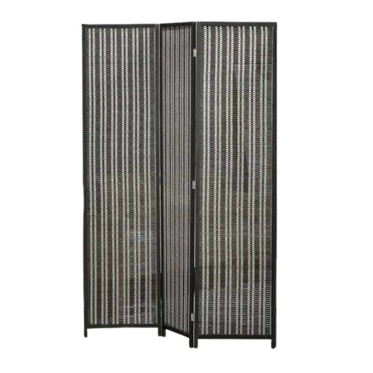 A bamboo screen serves as an elegant room divider, providing a natural touch and separation in the living area.