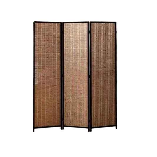 A bamboo screen serves as an elegant room divider, providing a natural touch and separation in the living area.