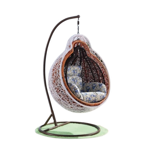A cozy hanging chair adorned with a vibrant flower pattern, perfect for relaxation and adding charm to any space.