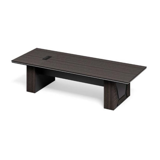 A functional work station with a desk, providing a conducive environment for professional tasks.