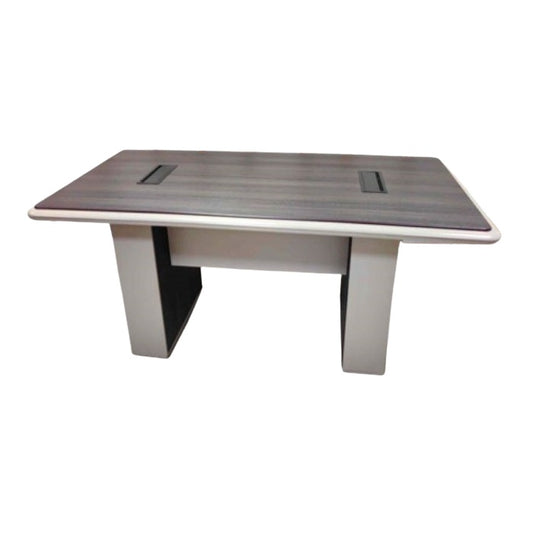 A functional  desk, providing a conducive environment for professional tasks.