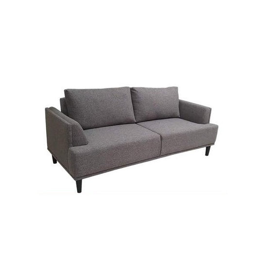 A modern brown couch with two accent pillows, offering a chic and comfortable seating option.
