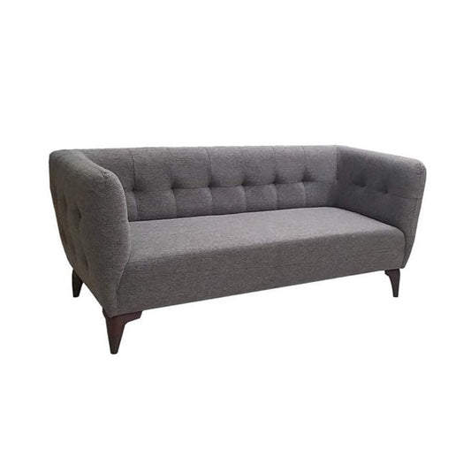 A modern grey couch with two accent pillows, offering a chic and comfortable seating option.