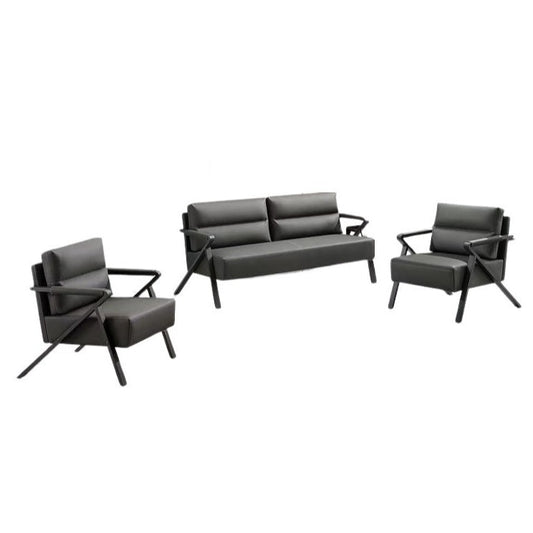 A sleek grey leather sofa featuring plush pillows, enhancing the elegance and comfort of the living space.