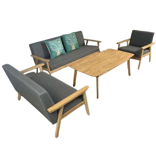 A living room setup featuring three couches arranged around a central table.