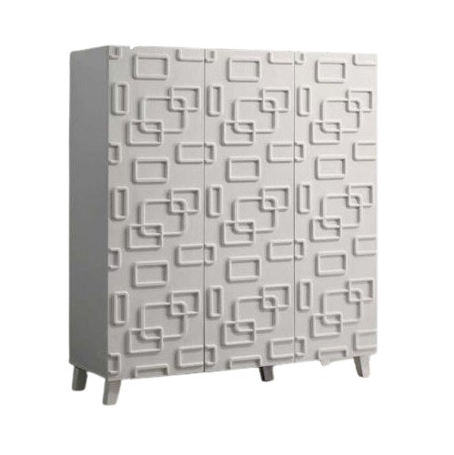 A white cabinet featuring a modern geometric design, showcasing clean lines and a contemporary aesthetic.