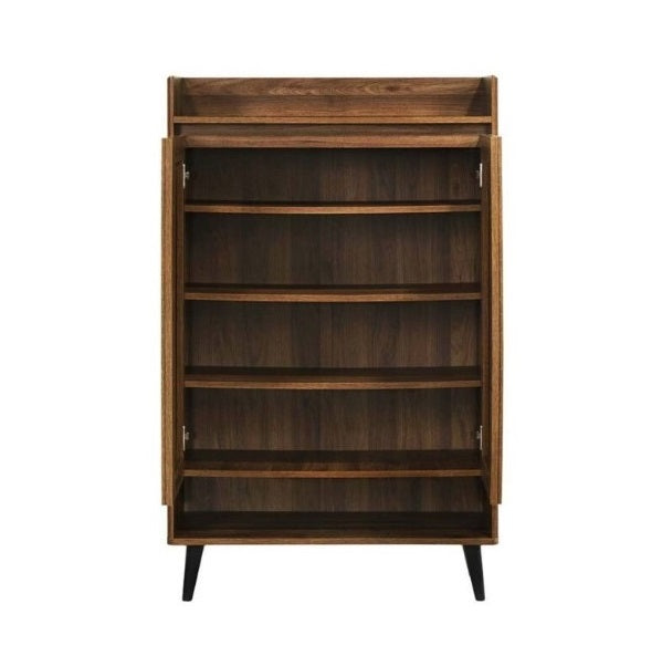 A wooden cabinet with a shelf above and two decorative baskets for practical storage solutions.