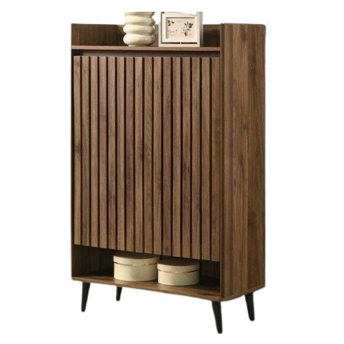A wooden cabinet with a shelf above and two decorative baskets for practical storage solutions.